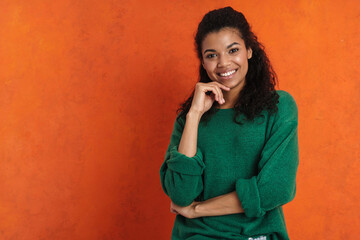 Happy smiling african casual brunette woman