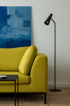 Modern Yellow Couch And Simple Lamp