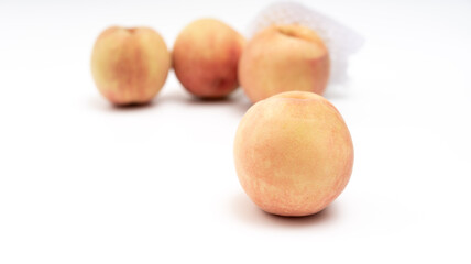 Fresh peach on white background
