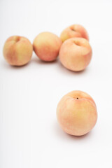 Fresh peach on white background