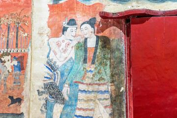 The painting of whispering love at Wat Phu Mintr. The famous painting wall named "Whisper of Love" or "Phu Mhan Ya Mhan (Thai Name) at the temple of Nan, Thailand