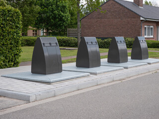 underground waste sorting containers on the edge of a residential area