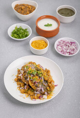 Aloo Tikki or Cutlet or Aloo Patties  dipped in Chickpea curry