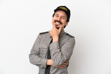 Young caucasian security man isolated on white background smiling