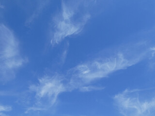 Naklejka na ściany i meble Clouds on the blue sky background and texture