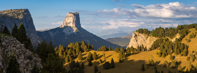 Mont Aiguille and The Vercors High Plateaus in Autumn at sunset (panoramic). Vercors Regional Natural Park in Isere (Rhone-Alpes), French Alps, France - obrazy, fototapety, plakaty
