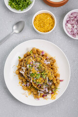 Aloo Tikki or Cutlet or Aloo Patties  dipped in Chickpea curry