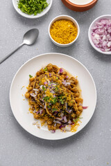 Aloo Tikki or Cutlet or Aloo Patties  dipped in Chickpea curry