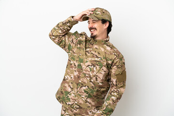 Soldier man isolated on white background has realized something and intending the solution