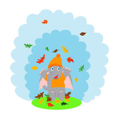 Obraz na płótnie Canvas a cute, happy cartoon elephant in a hat sits in a clearing, tossing autumn leaves. vector flat illustration