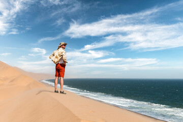 Single man in a cowboy hat in the Namib desert