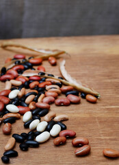 Mixed dry beans on wood