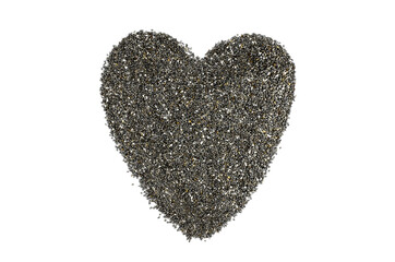 Heart made from chia seeds on a white background. Chia seeds on white background
