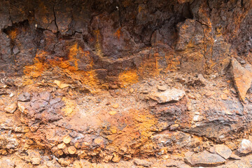 Steel surfaces located along the construction site that are affected by rust.