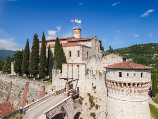 Drone view of the central entrance with a medieval drawbridge in the castle Of Brescia city