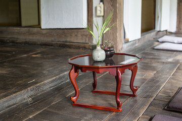 Wooden Korean tea Table with Traditional Korean House in the Historic Hanok.