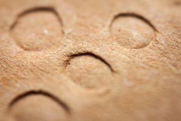 Extreme macro of embossed brown paper
