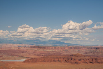 Vast view of Canyonlands National Park with gorgeous sky and layers of red rock canyon.