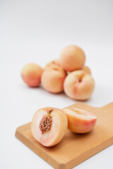 Fresh peach on white background