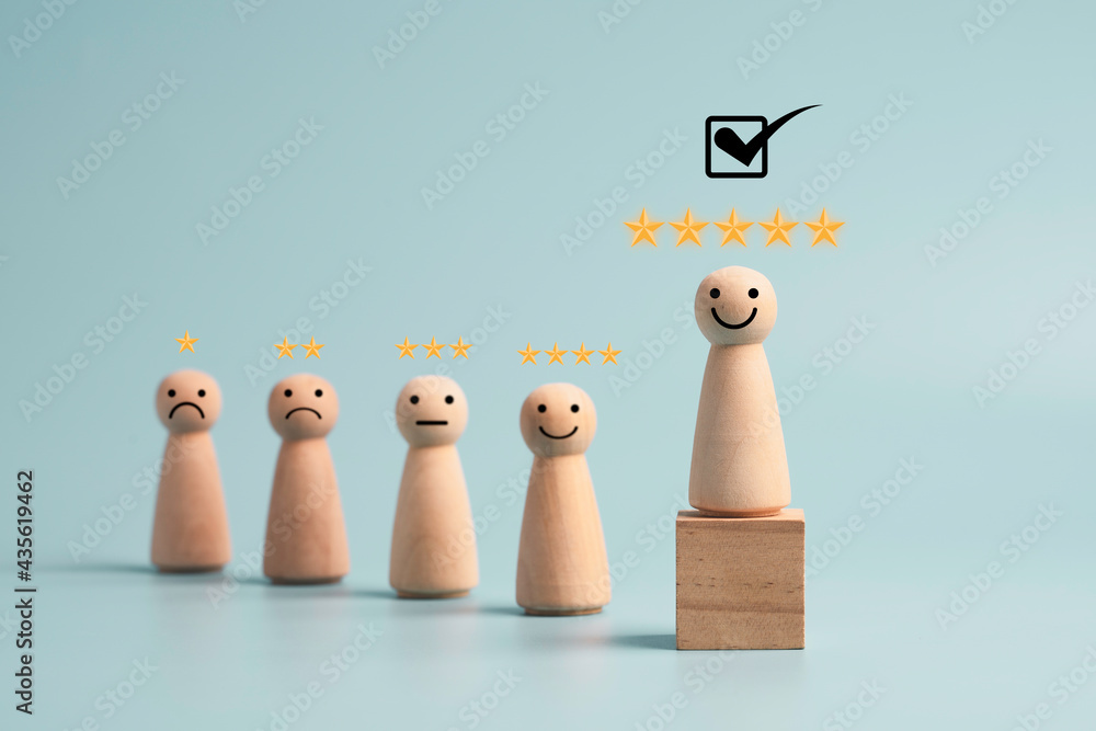 Poster wooden figure smiley with five yellow stars and standing on cube for select the best client and cust