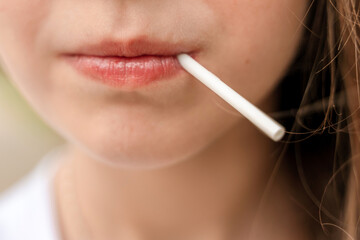 Little girl kid sucking lollipop