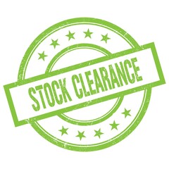 STOCK CLEARANCE text written on green vintage stamp.