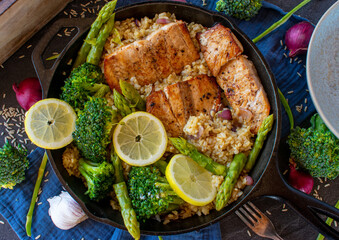 Salmon with brown rice and broccoli and asparagus