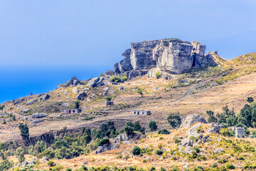 Ancient abandoned homes amongst unique rock formations in Calabria, Italy