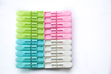 New plastic clothespin group have four color on isolated background