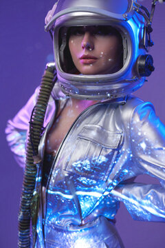 Nude Cosmic Woman In Silver Suit And Helmet