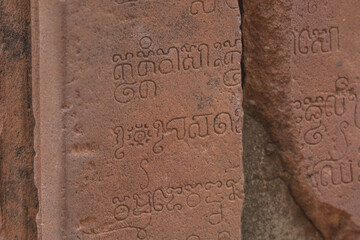 Ancient Khmer script in Banteay Srei, one of the most beautiful Khmer castles in Cambodia.