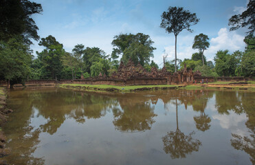 Ponds or barai around the pink sandstone castle Banteay Srei, one of Cambodia's most beautiful Khmer castles.