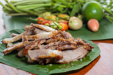Grilled pork neck with spicy Thai spicy sauce. Street food thailand.