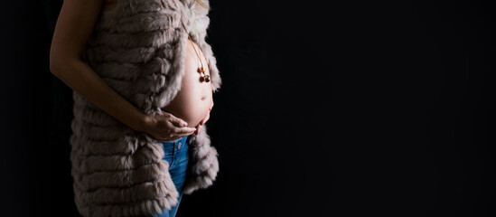 Belly of pregnancy women, hand holding tummy and expecting baby and mexican bola or chiming...
