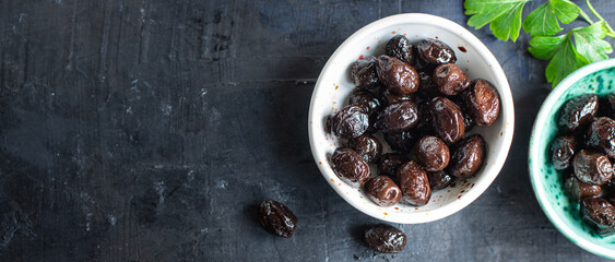 dried olive sun-dried olives dry fruit appetizer salad addition on the table healthy food meal snack copy space food background rustic top view