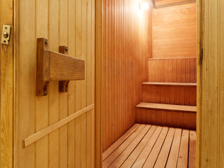 spa treatments with a broom sauna in a wooden decoration