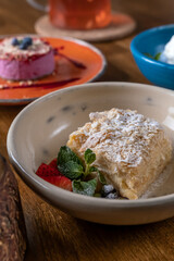 Tasty desserts. Creamy vanilla slice cake Napoleon with berries