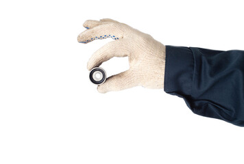 Fototapeta premium An auto mechanic holds in his hand a faulty timing belt idler on a white background, isolate. Close-up, inspection