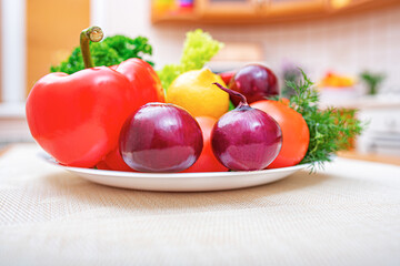 Vegetables on the kitchen table. Healthy food products on the table in the kitchen.