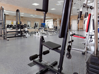 Fototapeta na wymiar sports fitness room with sports equipment and exercise equipment