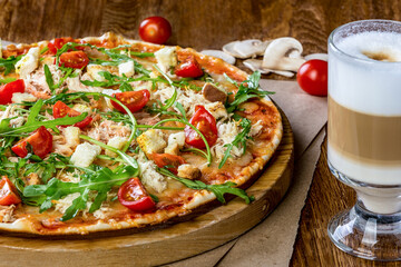 pizza with salami and juice