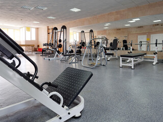 Fototapeta na wymiar sports fitness room with sports equipment and exercise equipment