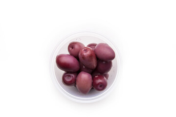 School lunch box snack for kids over white background. Back to school. Healthy and fun snack option for parents. Bow with olives.