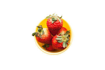 School lunch box snack for kids over white background. Back to school. Healthy and fun snack option for parents. Bow with strawberries.