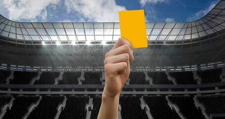 Animation of referee holding yellow card on pitch in sports stadium