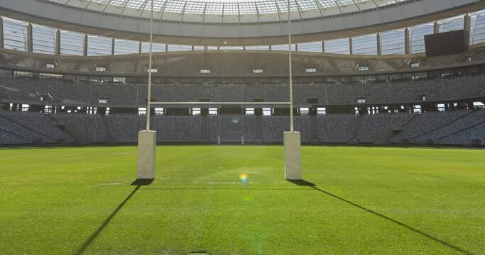 Animation of empty stands with rugby pitch in sports stadium