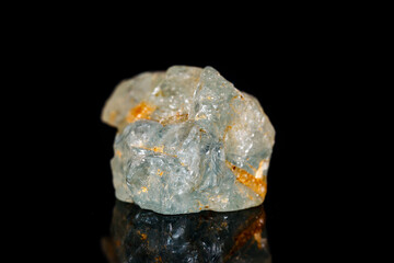 Macro mineral stone Topaz on black background