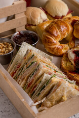 full breakfast with coffee, toast, croissants ready to eat