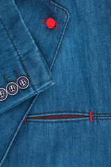 Elegant denim suit. Male jacket with sleeve and buttons, close-up. Mens fashion.