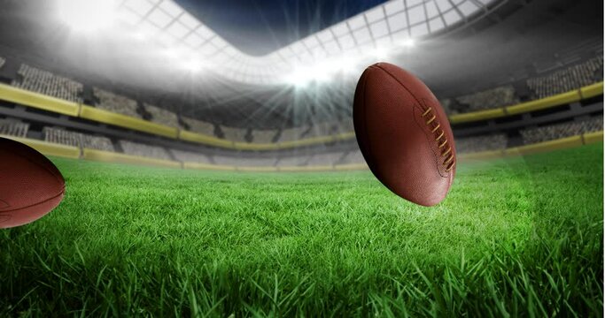 Animation of rugby balls bouncing on grass over sports stadium